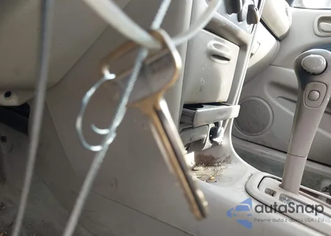 2000 Toyota Corolla Ce из США, поврежденный, VIN 1NXBR12EXYZ337319